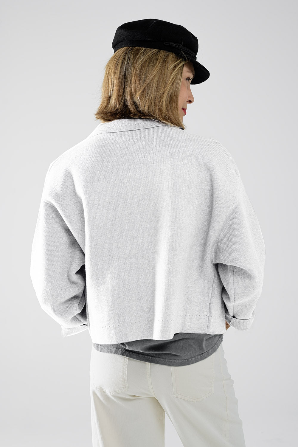 Cardigan tricoté décontracté de haute qualité de couleur crème