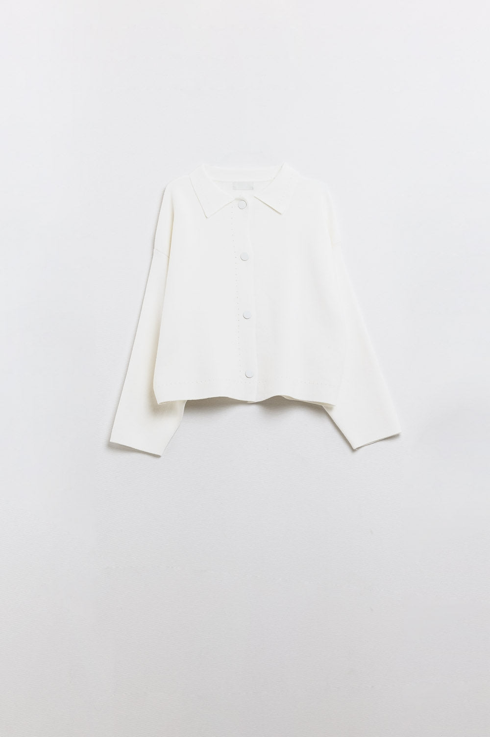 Cardigan tricoté décontracté de haute qualité de couleur crème