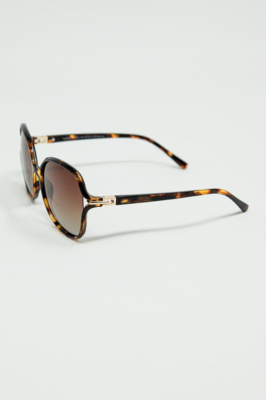 Round beige printed sunglasses with gold metal detail - Sunglasses