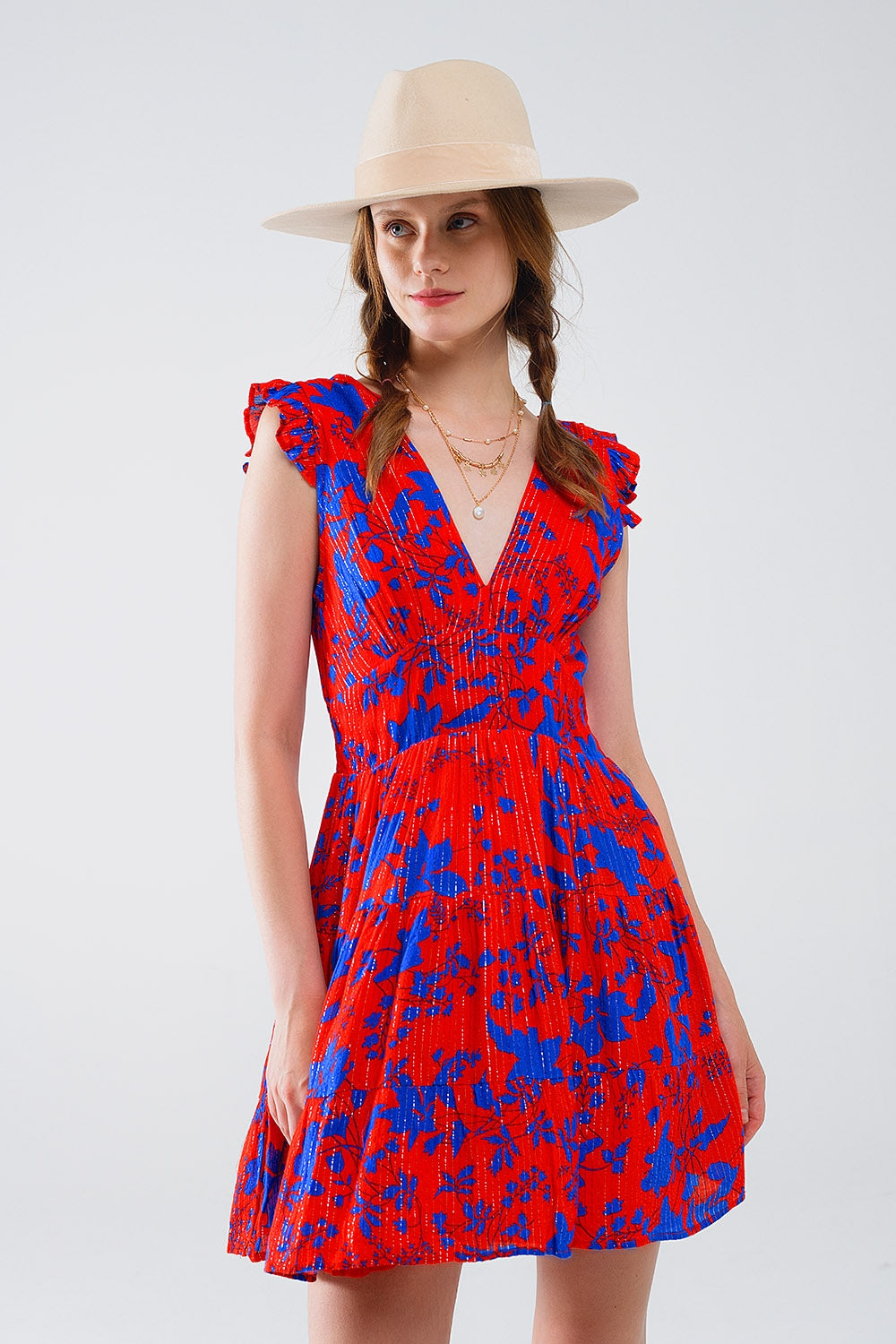 Robe courte rouge à imprimé floral bleu et col en V