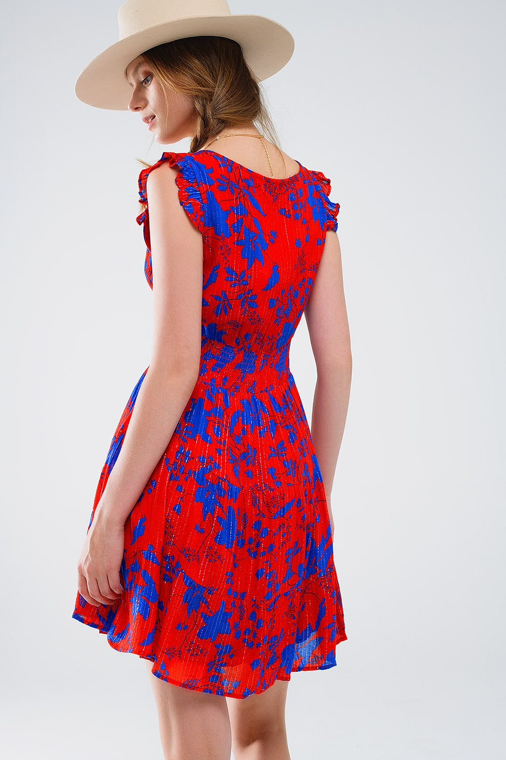 Robe courte rouge à imprimé floral bleu et col en V