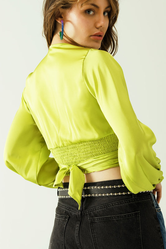 Short green crop top with long and wide sleeves - Tops
