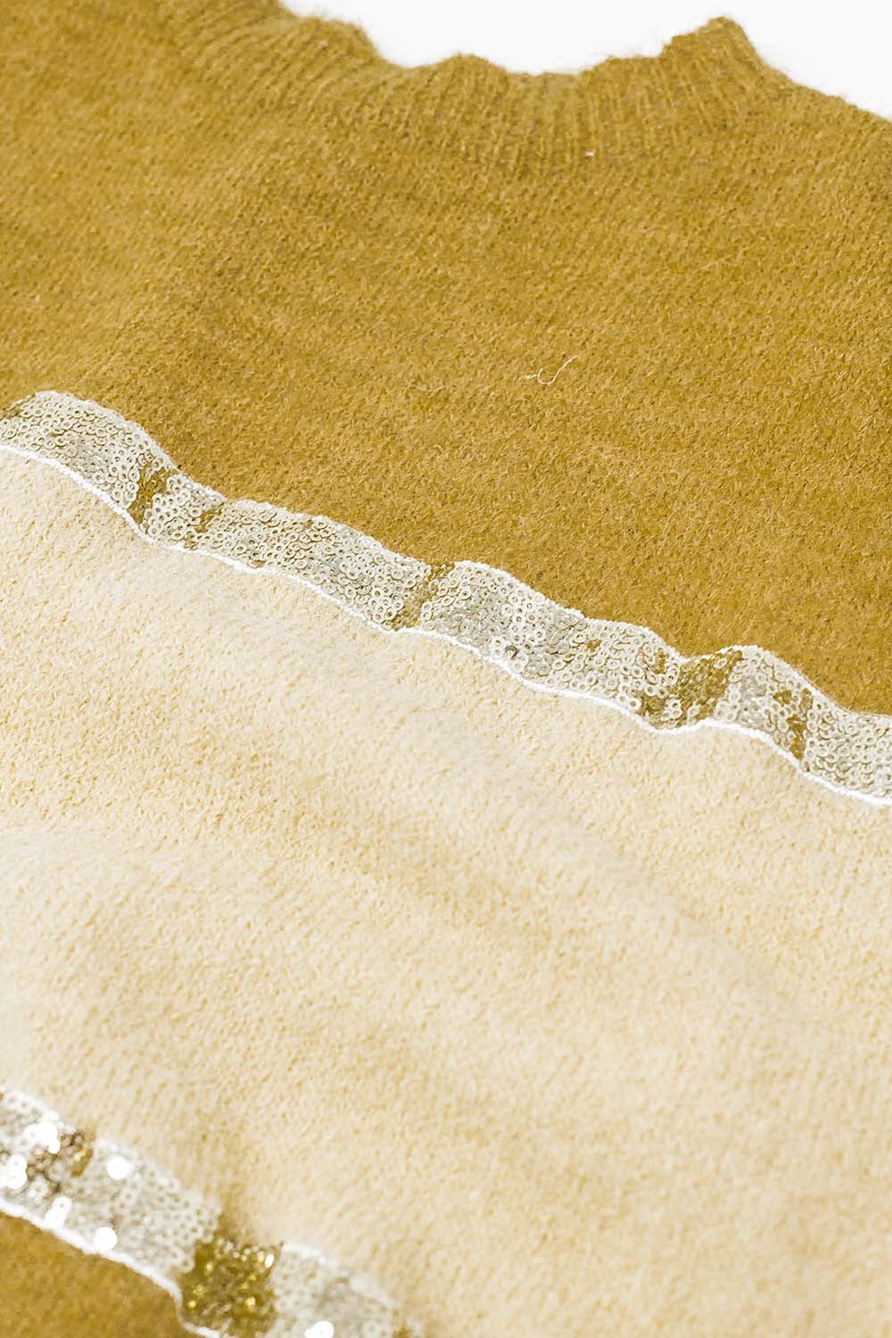 Pull beige sans manches avec détails pailletés