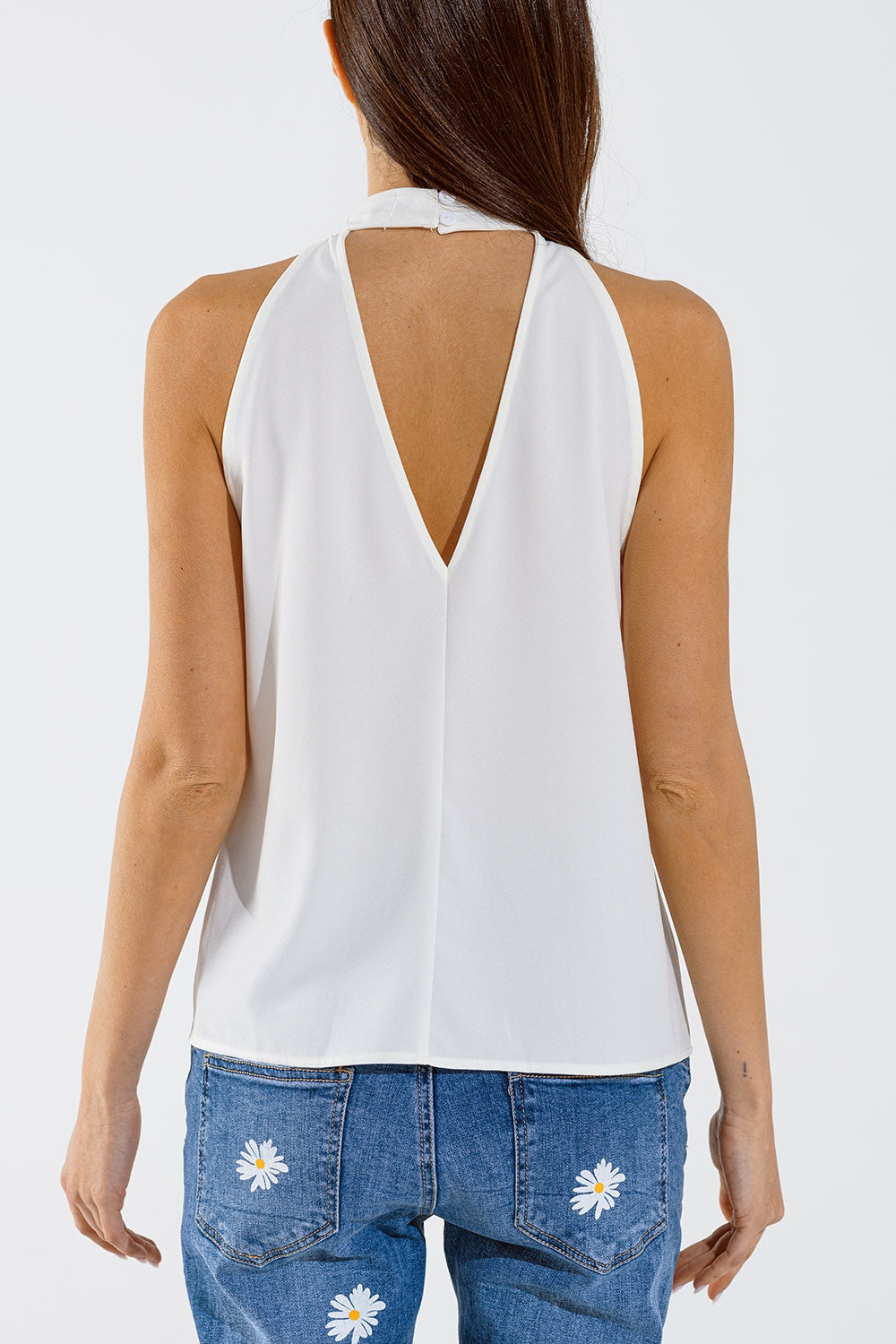 Sleeveless White Top with Ruffled Details and High Neck Q2 Tops BoutiqueLua