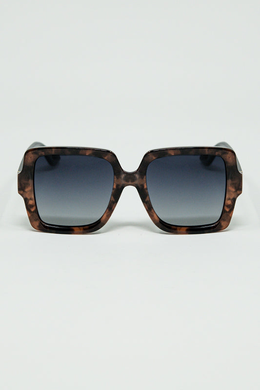 Sunglasses with a brown print frame and black temples - Sunglasses