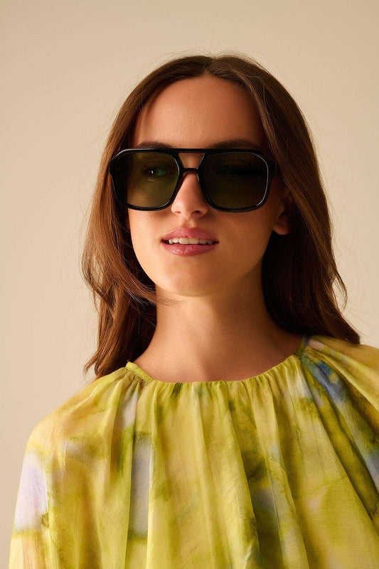 Sunglasses with black frames and green lenses - Sunglasses