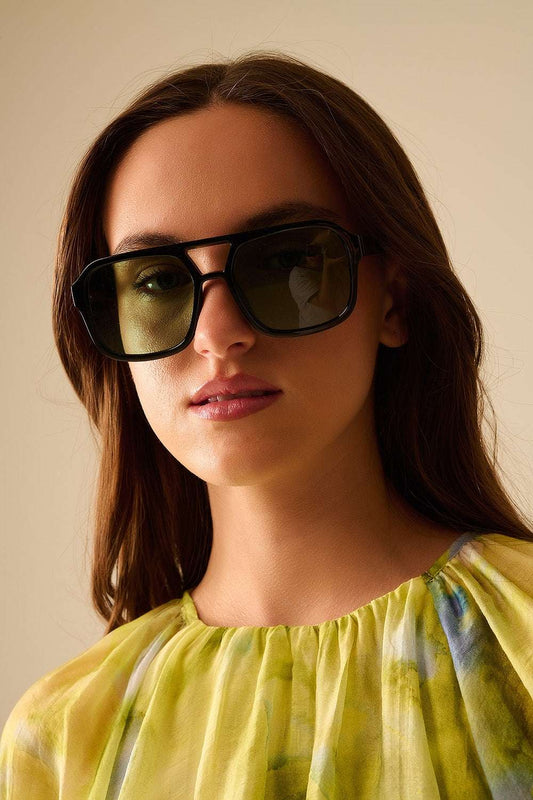 Sunglasses with black frames and green lenses - Sunglasses