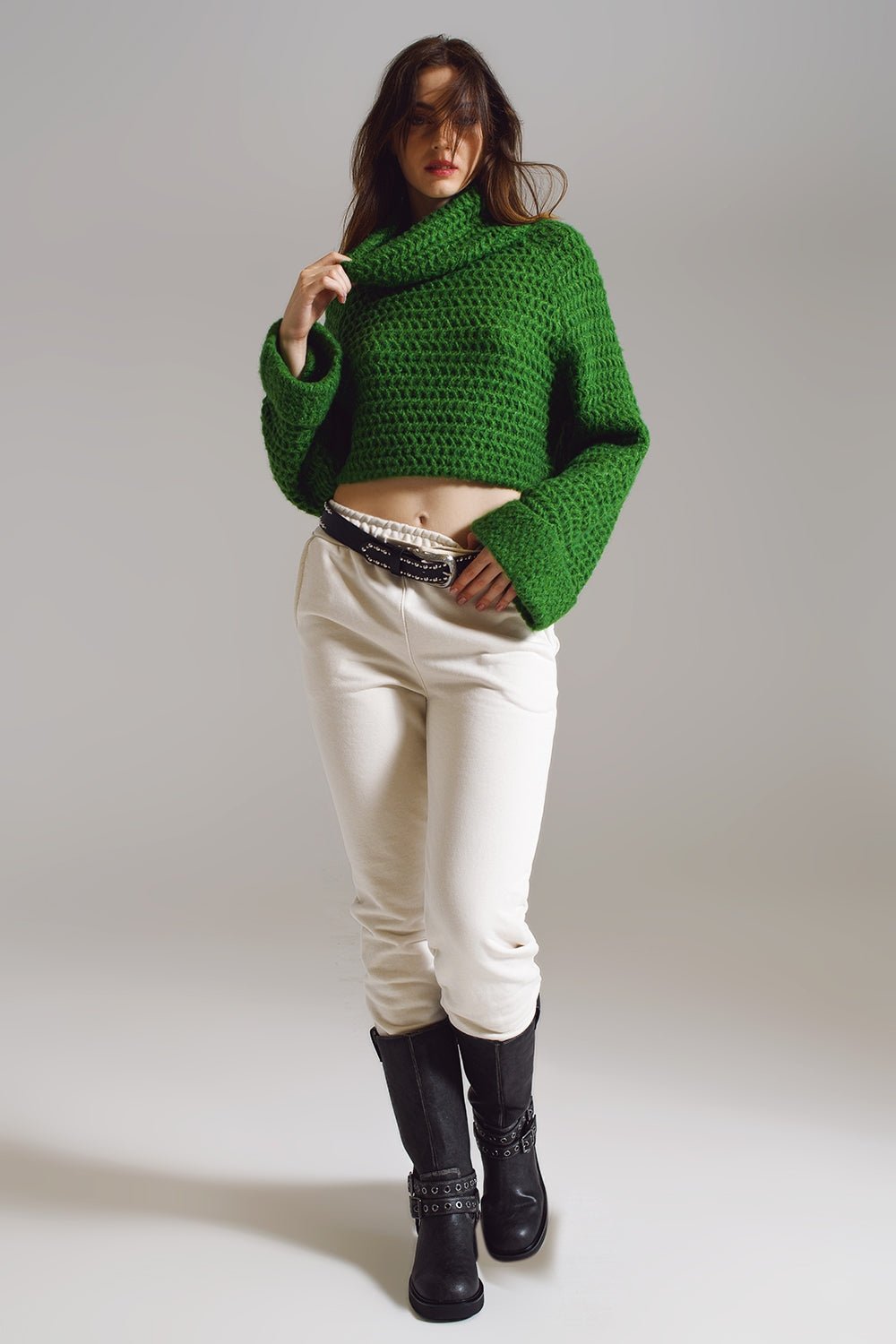 Pull en tricot gaufré avec col roulé et poignets roulés en vert
