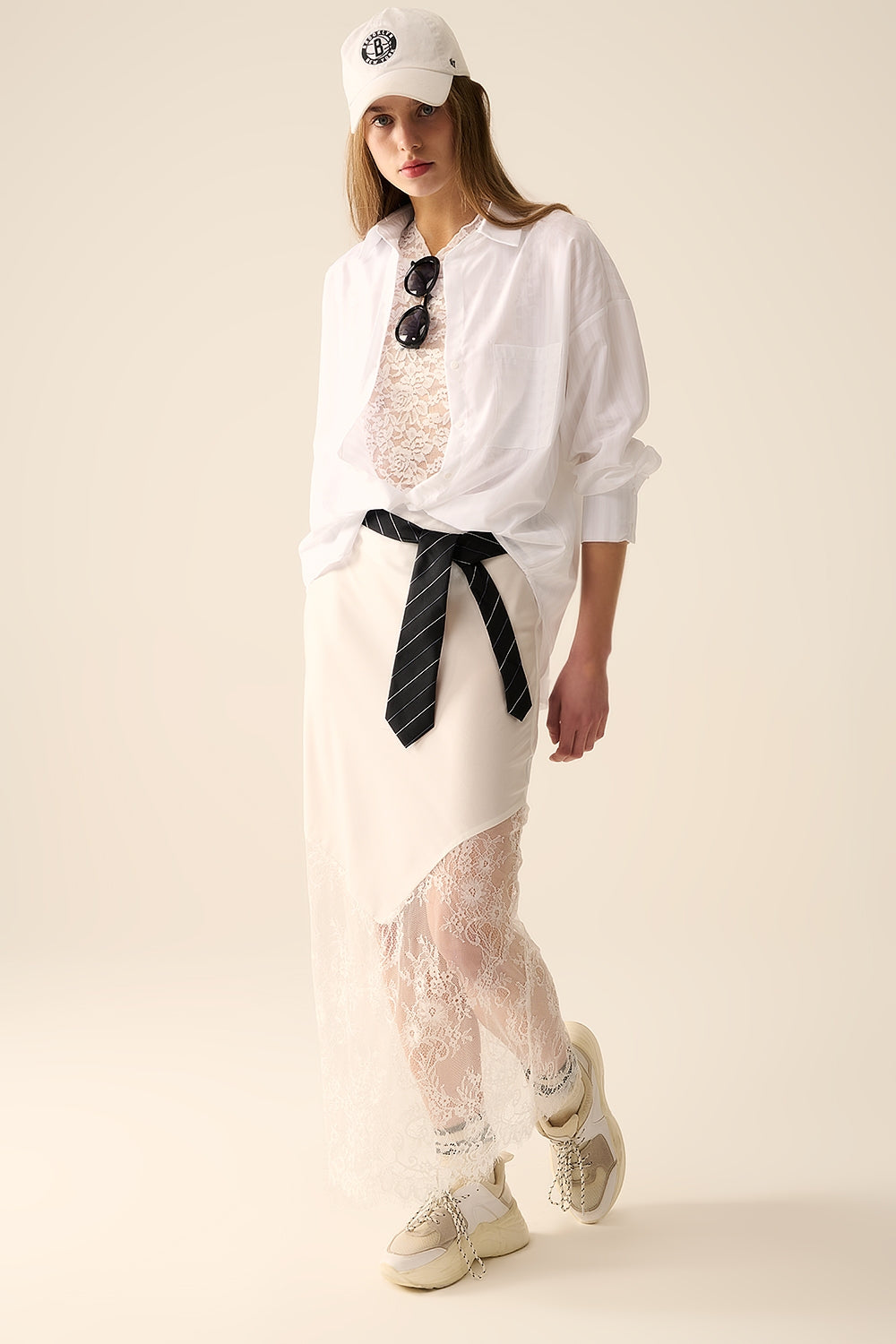 white satin skirt with lace at the bottom