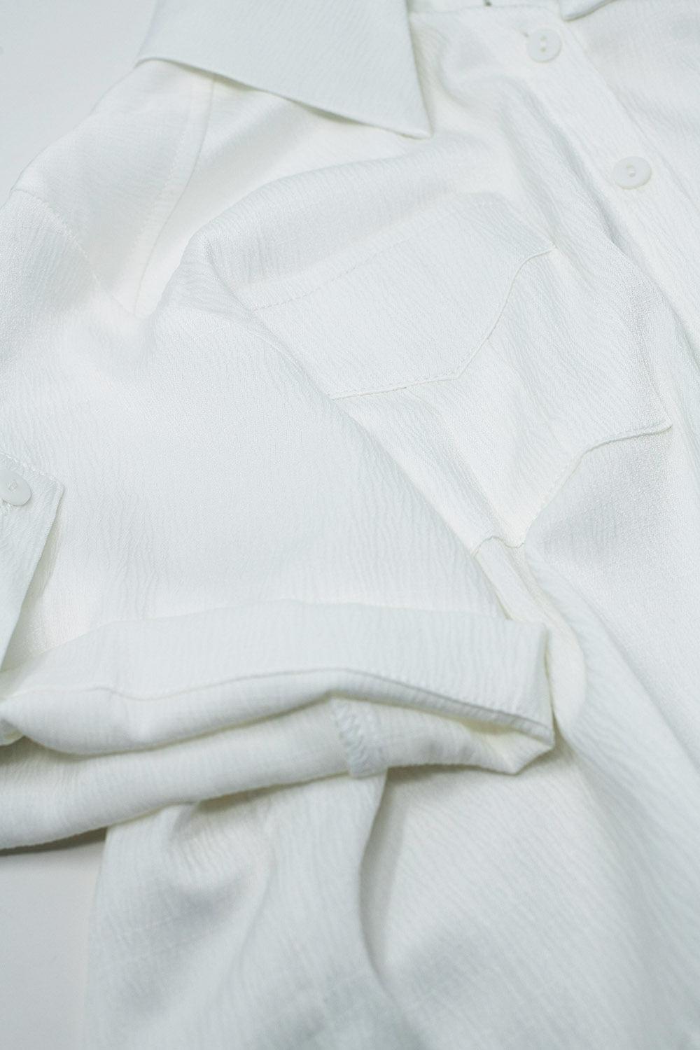 White Short satin Blouse With Chest Pockets And Drawstrings At Bottom Q2 Shirts BoutiqueLua