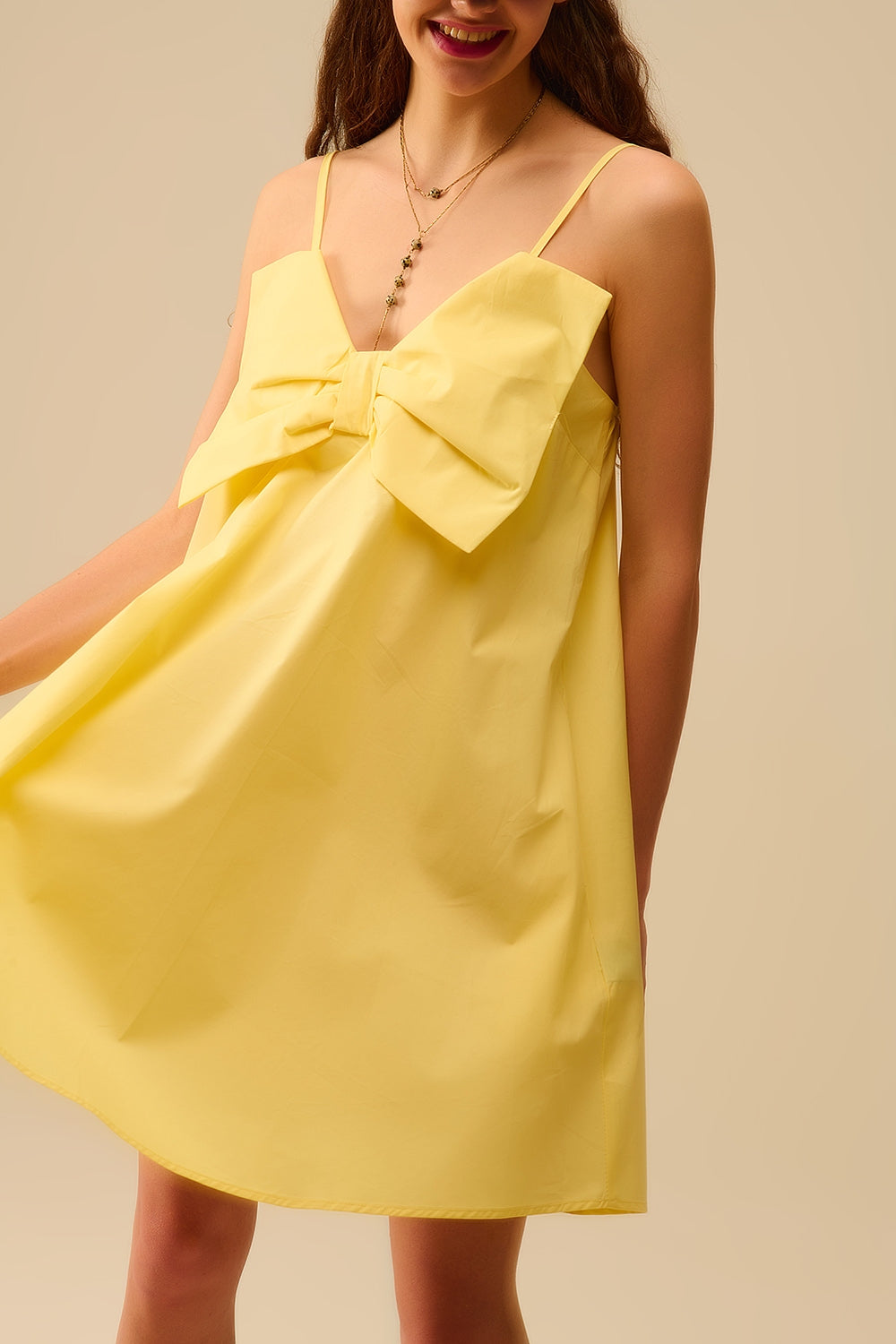 Yellow poplin mini dress with a big bow detail - Dresses
