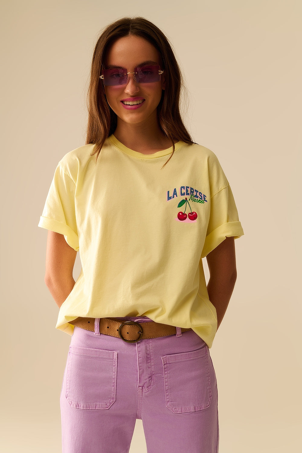 Yellow T-shirt with La Cerise Market Saint-Tropez graphic